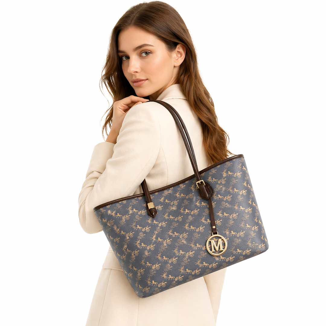 Large tote bag for women styled beside a book for a refined workday carry look.