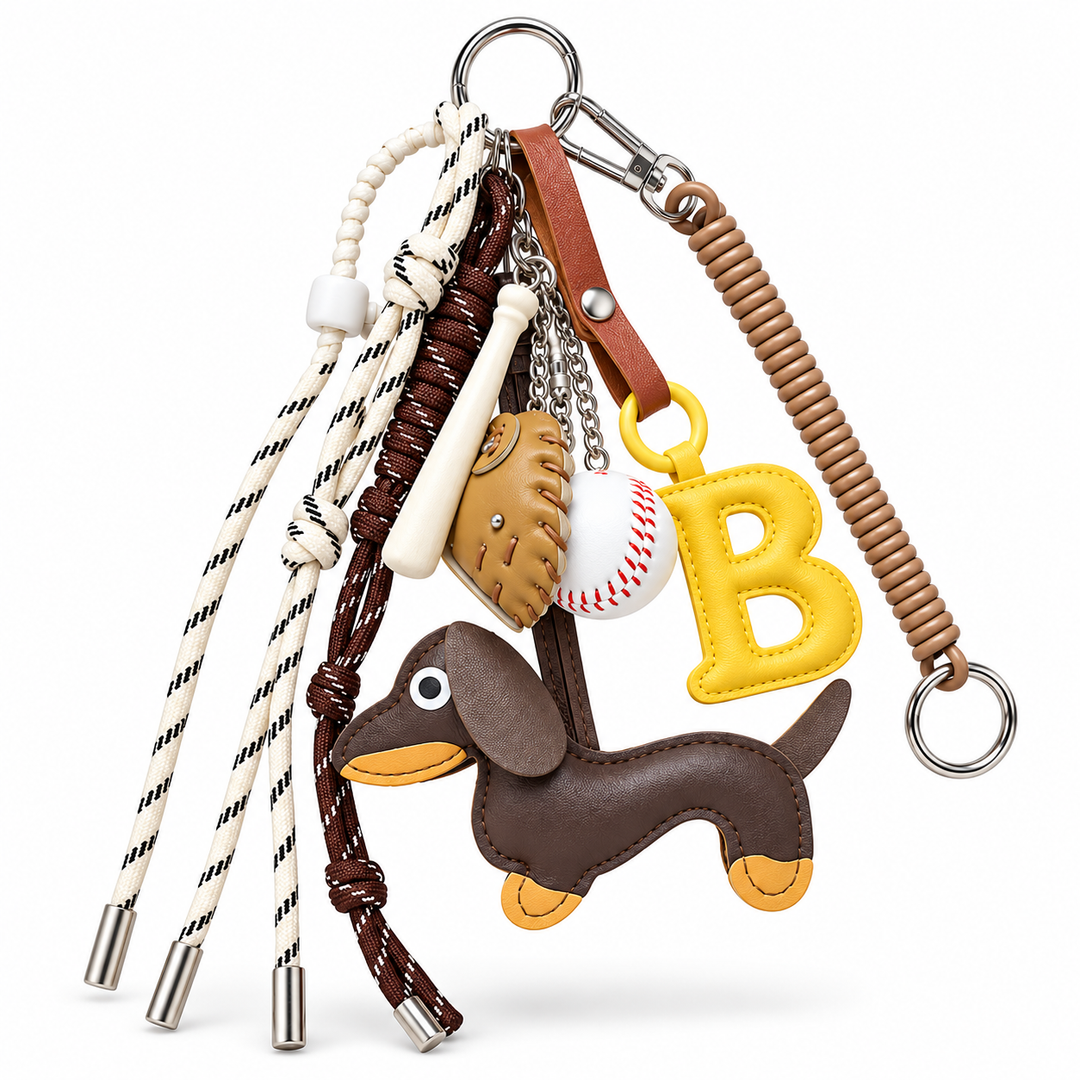 Baseball bag charm set shown hanging at an angle with all charms and cords visible