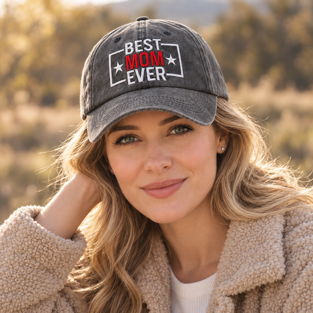 Woman wearing Best Mom Ever adjustable hat outdoors with washed black finish and embroidered front design