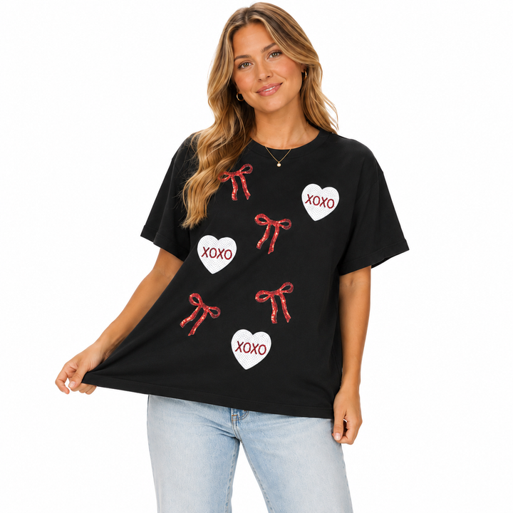 Loose fit Valentines day graphic tee for women with XOXO bow, heart accents and easy coffee run outfit style ideas now daily.