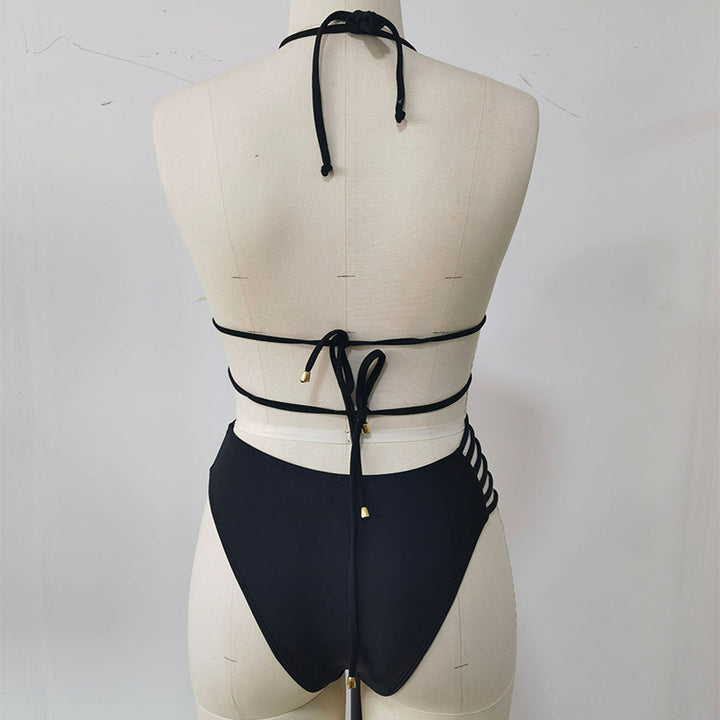 Black bikini back view on a supplier mannequin showing neck ties, back ties, metal-tipped cords and rear of matching bottoms.