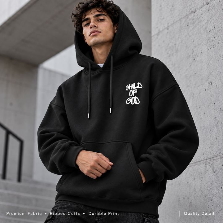 Black hoodie quality detail showing fabric, ribbed cuffs, pocket and chest print