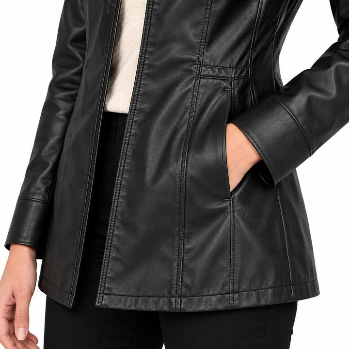 Close-up of black jacket pocket, cuff, front edge and tailored stitching