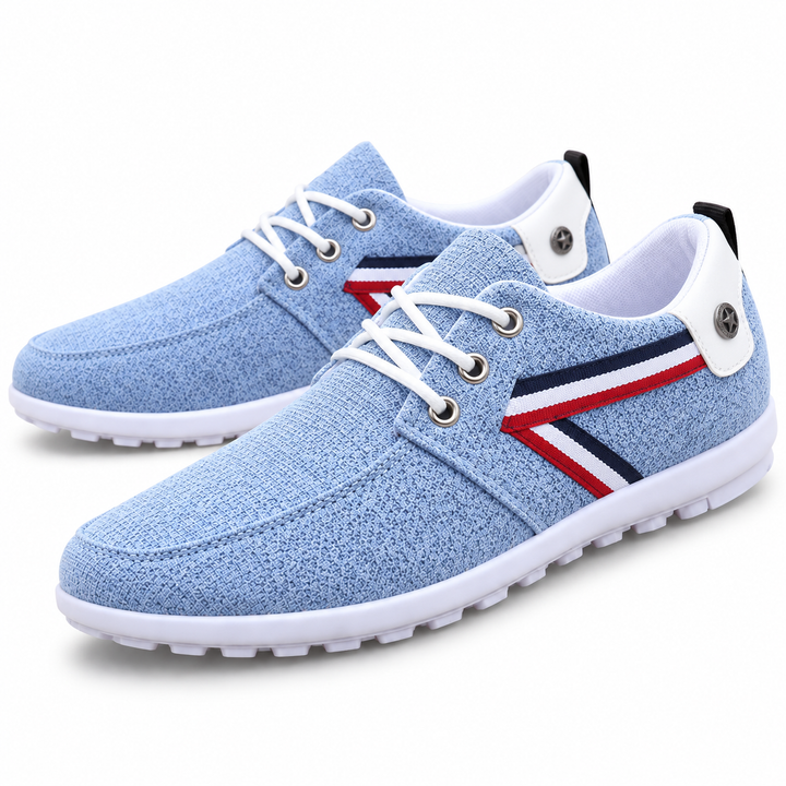 Blue lace-up shoe with tricolor chevron side detail and white outsole
