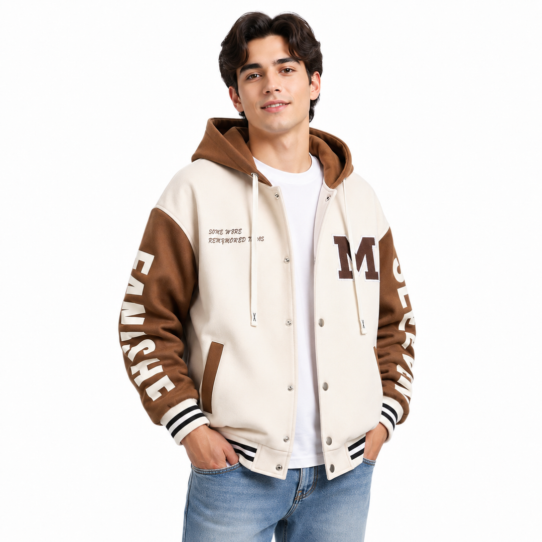 Cream and brown colorblock hoodie jacket on male model in a clean studio pose with hood and striped ribbing visible