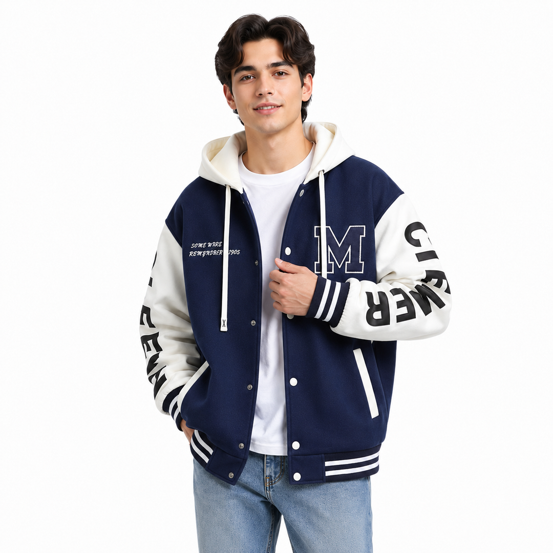Navy and white colorblock hoodie jacket shown on male model in a relaxed pose against a clean white background
