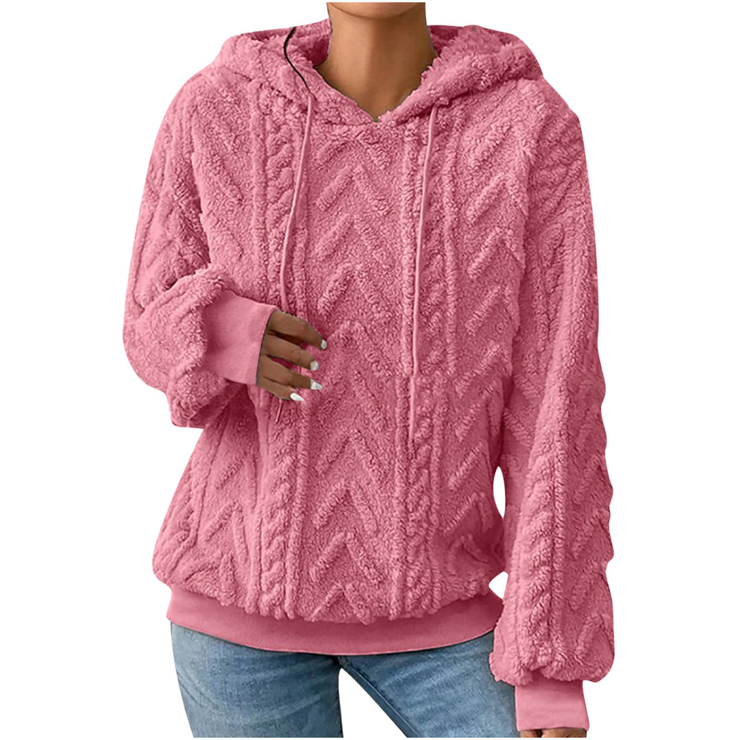 Peach textured hoodie on a model, shown from the front. The textured fabric appears in the pictured style and garment design.