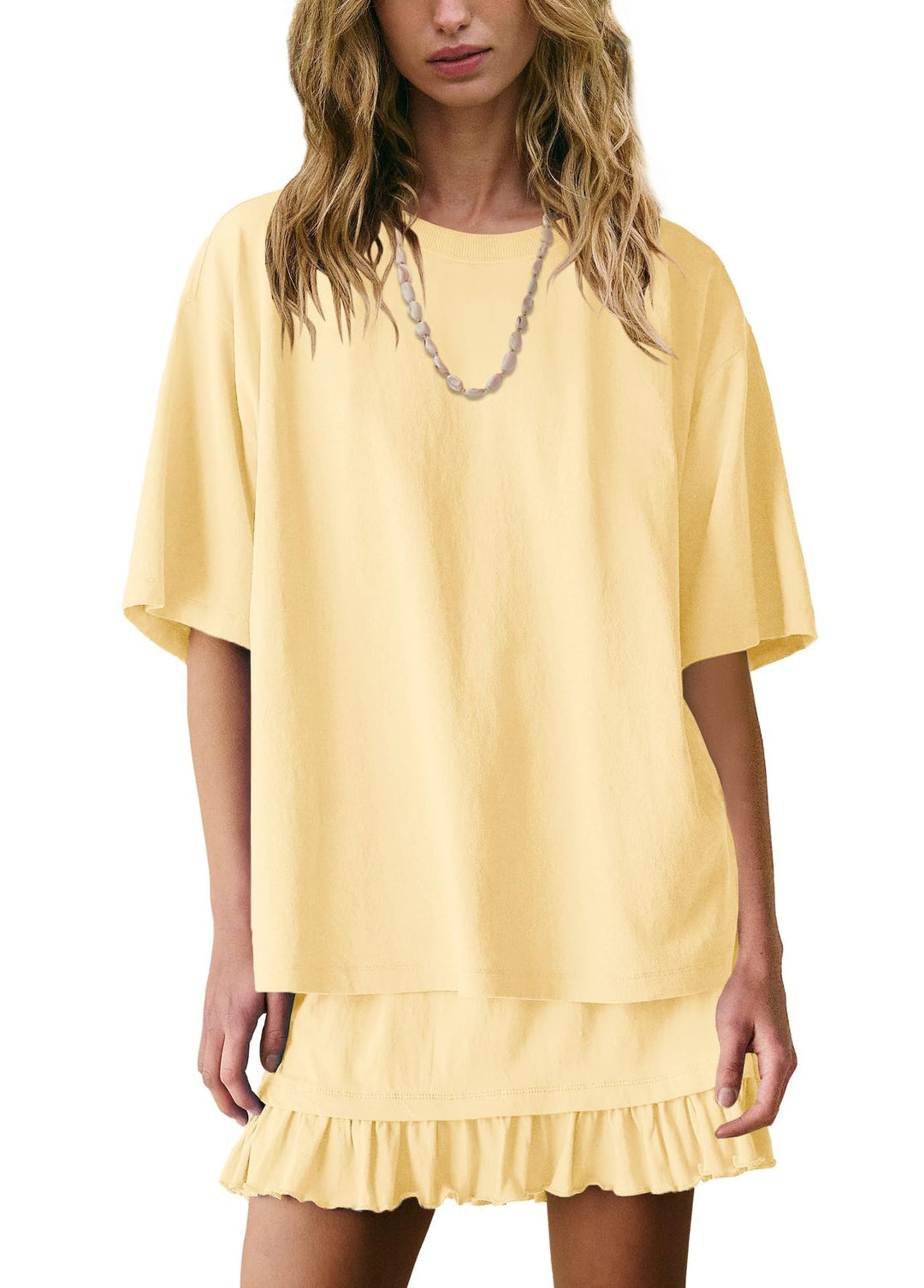 Women’s solid color skirt set with loose short sleeve top and ruffle hem skirt for easy casual styling and everyday wear.