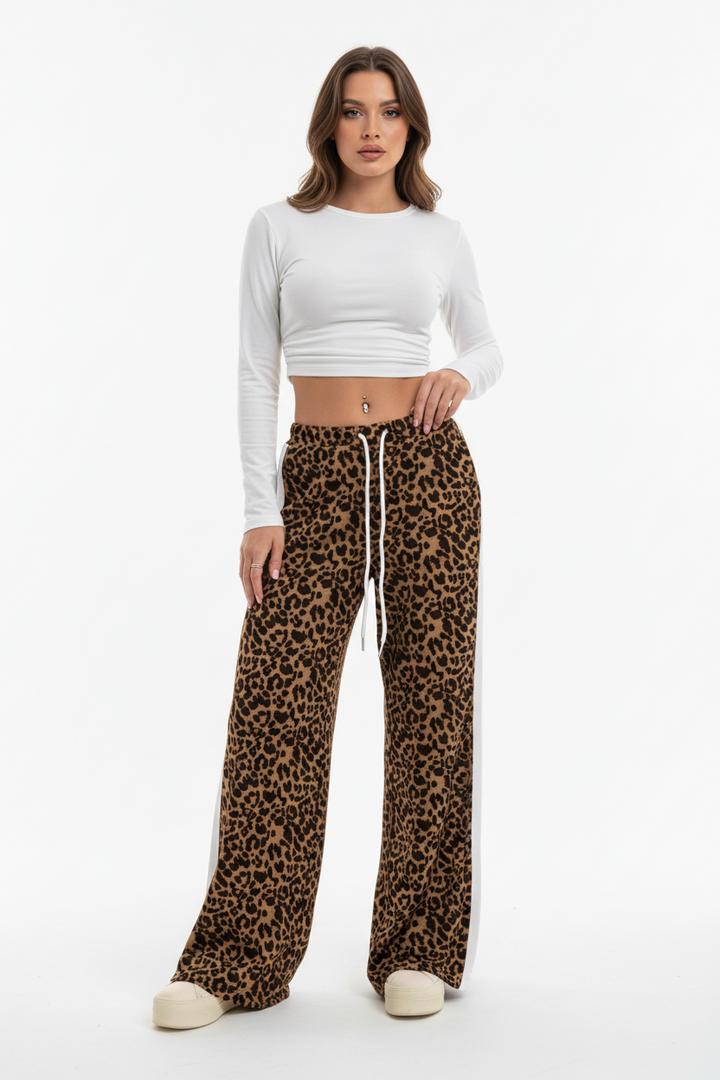 Coffee-toned leopard wide-leg pants styled with pointed mules for a smart-casual outfit