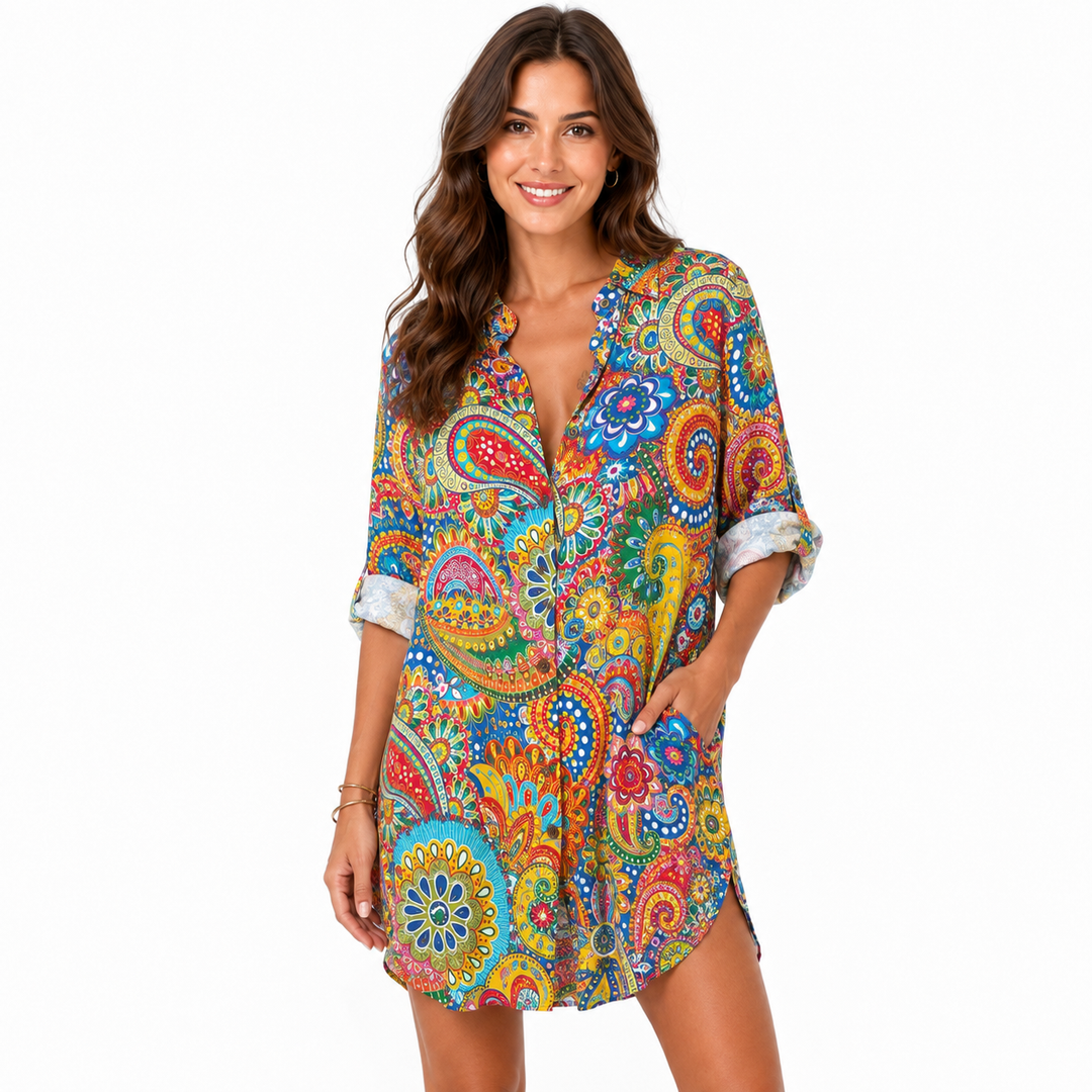 Printed shirt dress detail view showing colorful pattern and pocket placement, displayed clearly for outfit reference online.