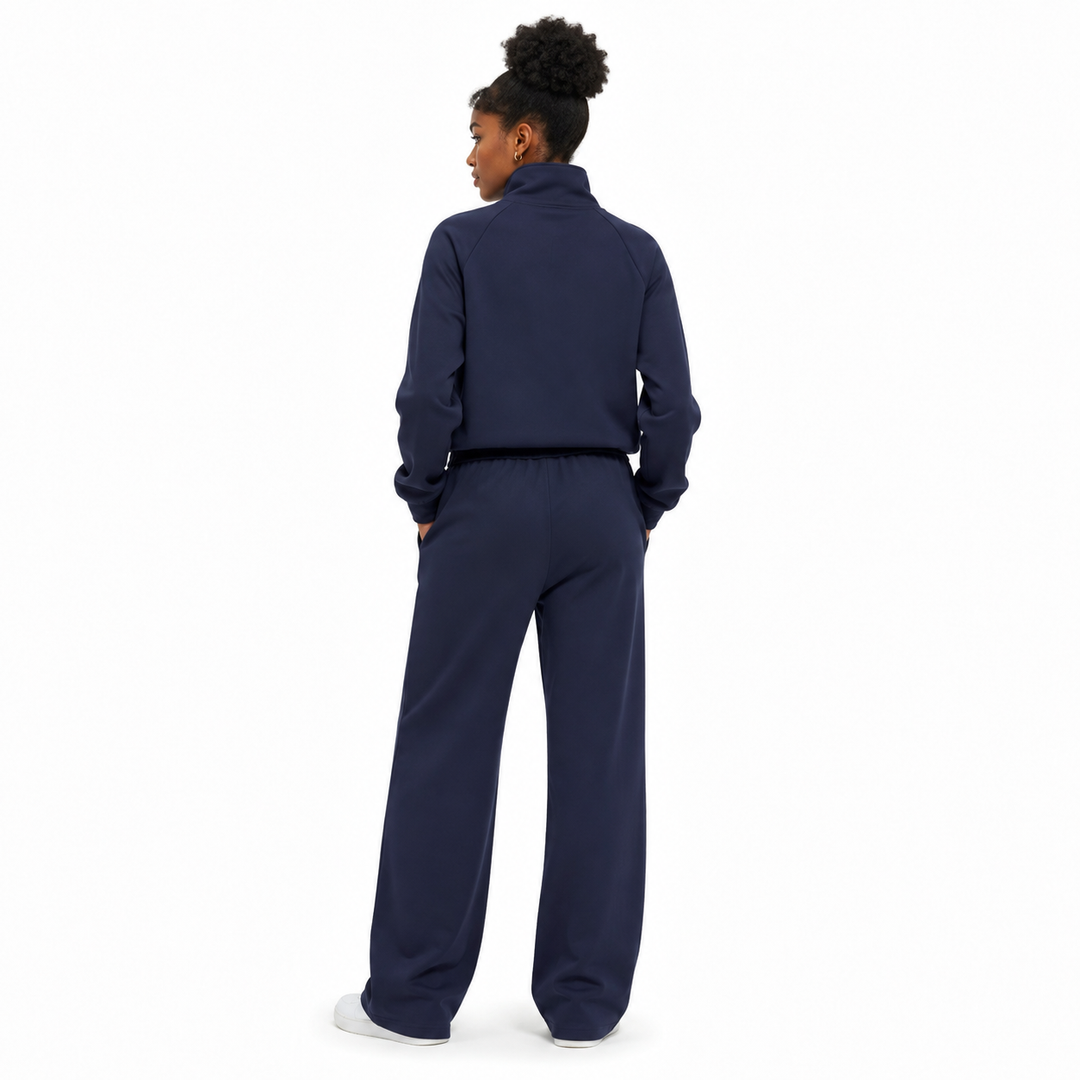 Wide leg sweatpants set with an elastic waistband and matching half zip top for comfortable, modern everyday outfits for her.
