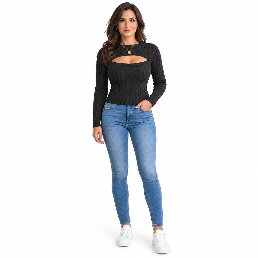 Black cutout sweater on a second adult brunette model, showing the cable knit front and long sleeves with blue jeans on white