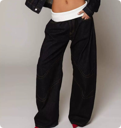 Black wide-leg pants worn by a person on a plain background