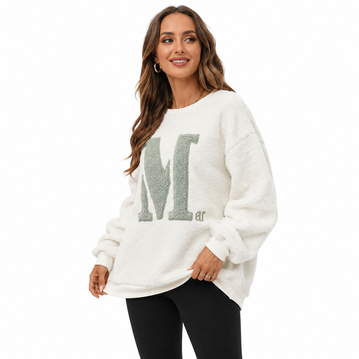 Fleece sweatshirt for women with plush interior, classic round neck and relaxed fit for effortless everyday outfits wear now!