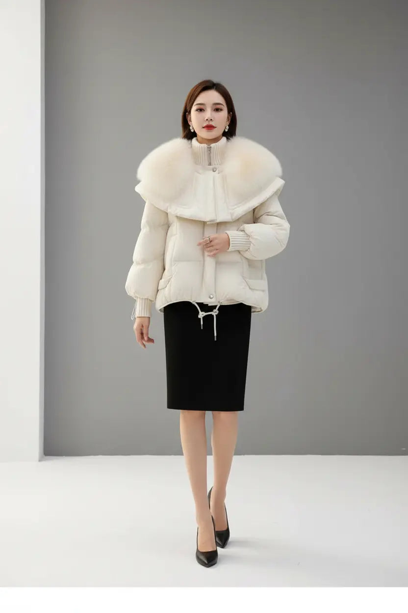 petite parka coat in white with dramatic faux fur collar, padded sleeves, snap placket and two front pockets
