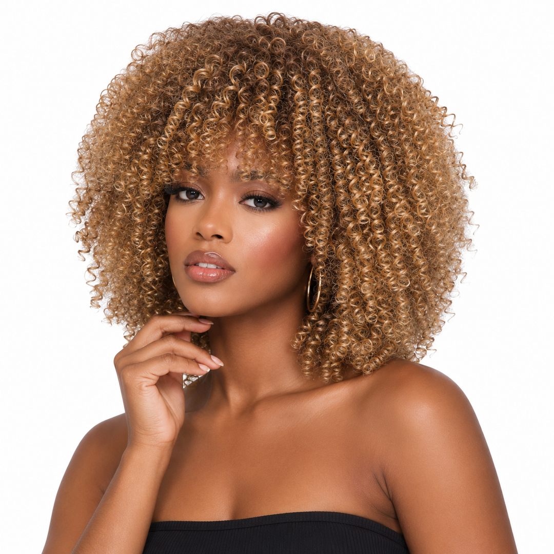 Short curly wig with bangs shown at a three-quarter angle to highlight face-framing shape, defined curls, and refined volume.
