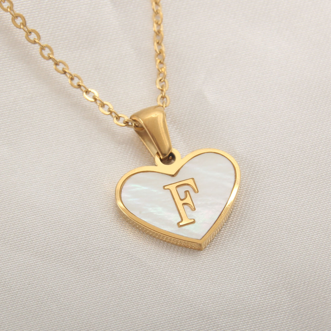 Heart pendant necklace with selectable letter variants A to Z, gold-plated finish and 45+5 cm chain - PrintOne1 product view.