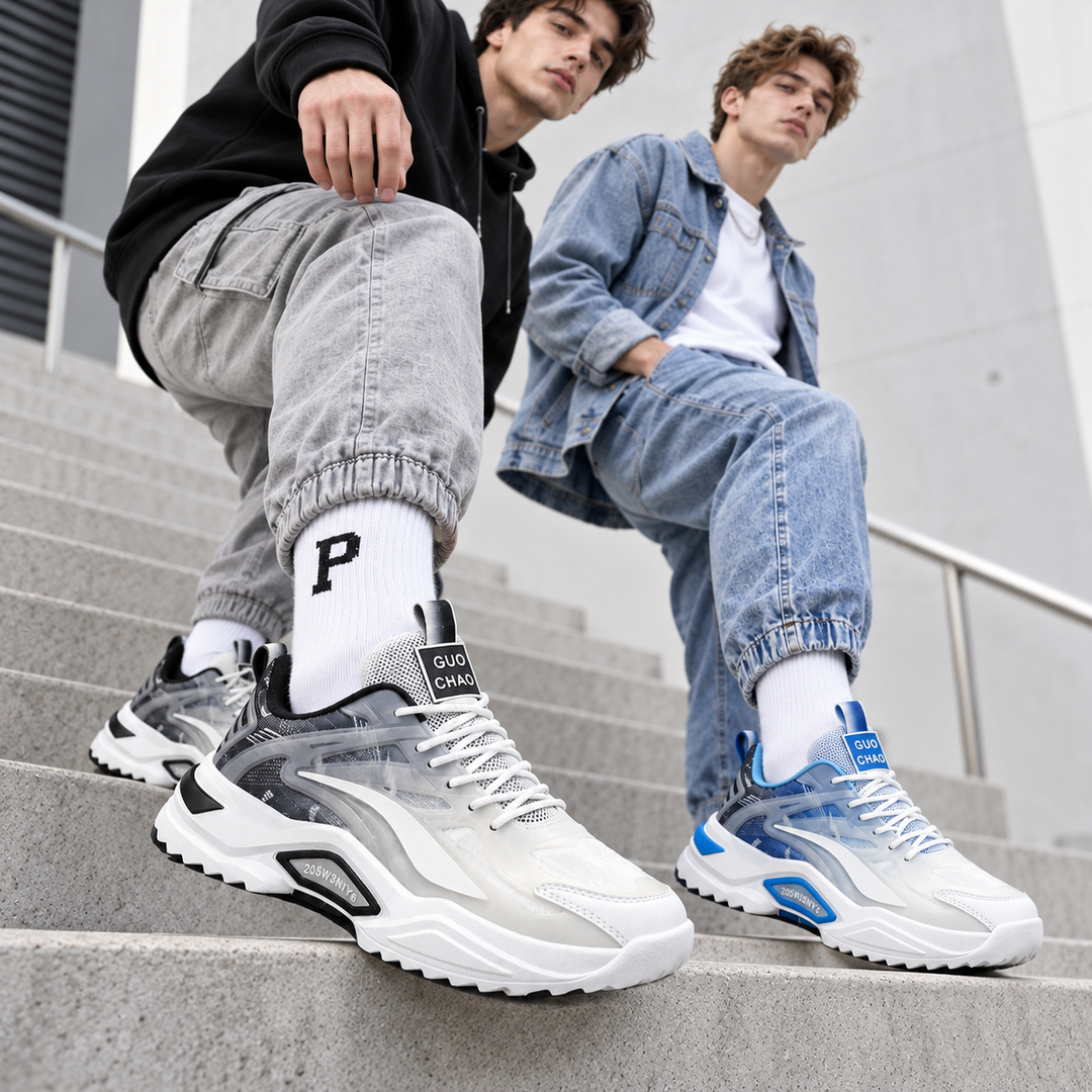 Two male models wearing the white and black and white and blue dad sneakers on concrete steps in a conversion-focused product hero image.