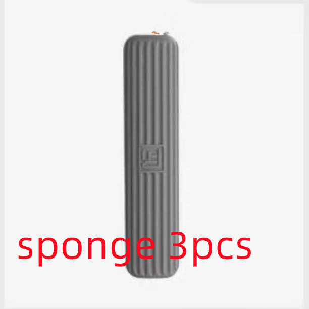 Gray sponge with a textured surface on a white background, labeled &