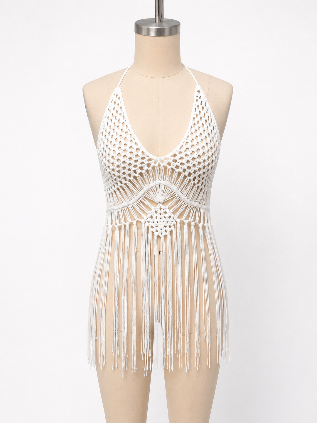 Boho crochet bikini cover up with decorative tassel detail and lightweight open weave design for warm weather styling