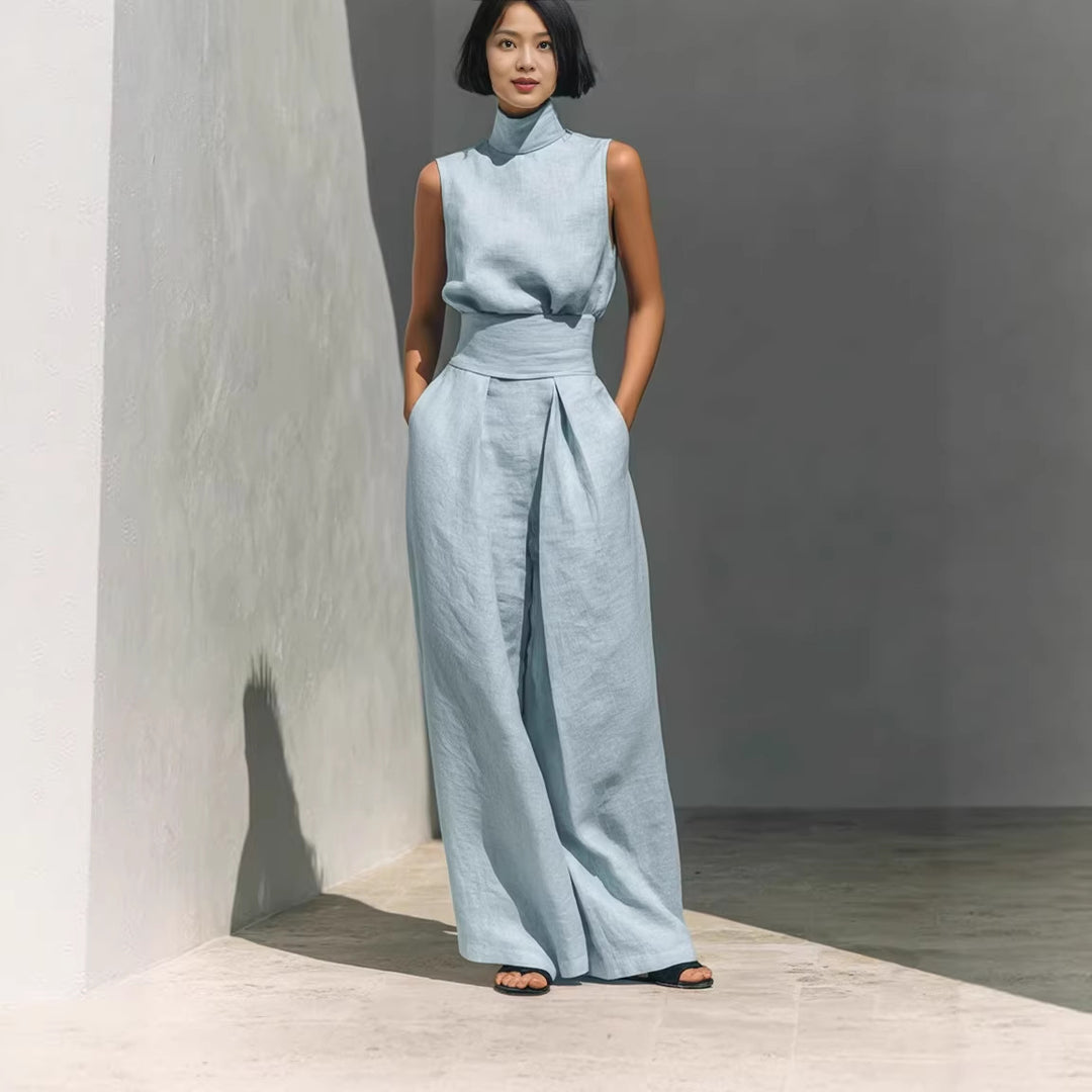 Back detail of tank top showing clean seams and relaxed fit in breathable polyester
