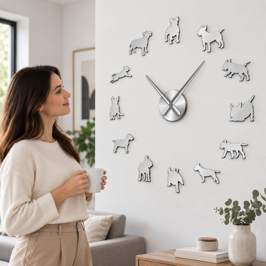 Silver dog wall clock installed in a modern living room with twelve dog silhouette markers arranged around the central clock hands.