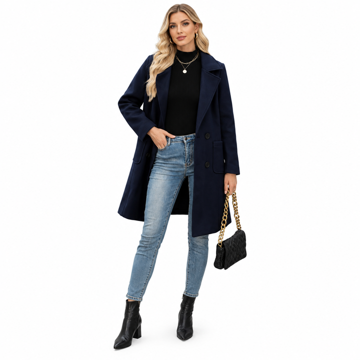 Navy blue coat styled with jeans and ankle boots