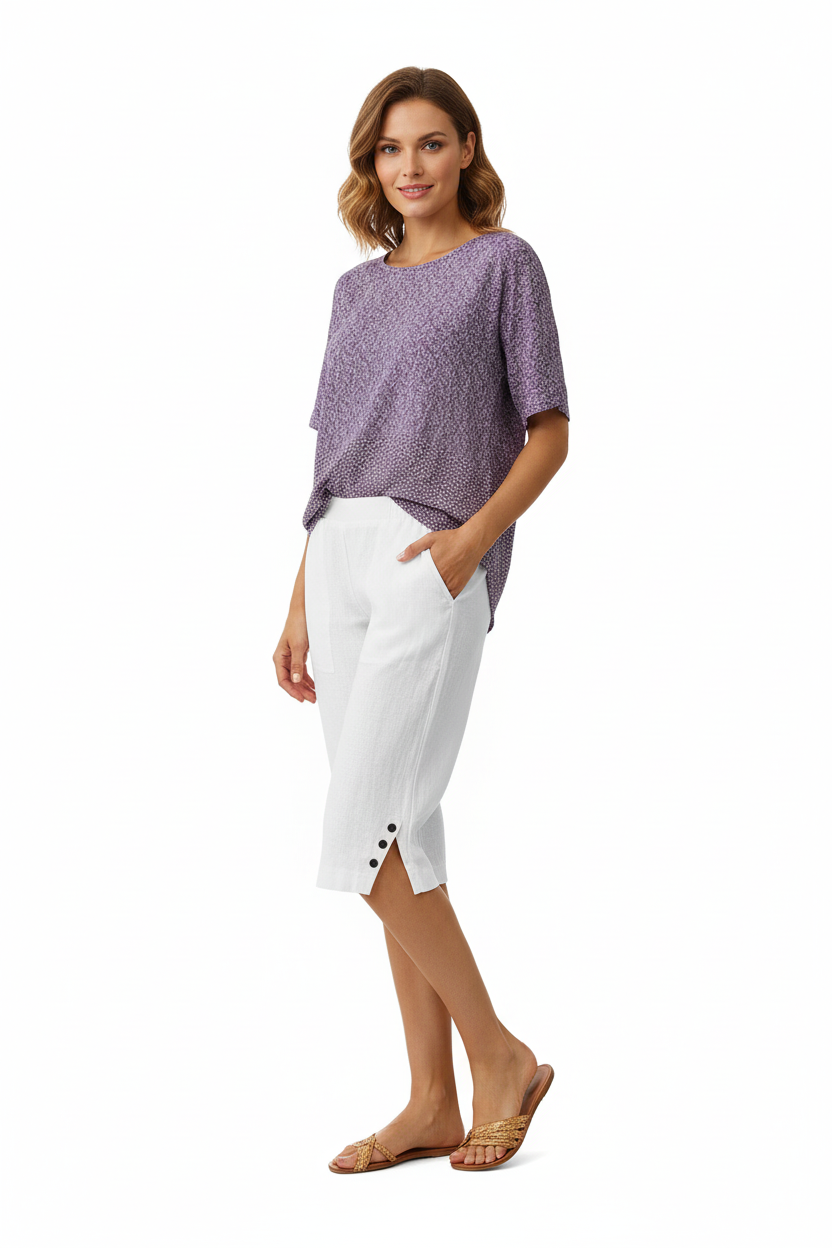 Women's linen drawstring shorts white, light and breathable, worn with tucked white tee, effortless summer casual outfit inspo
