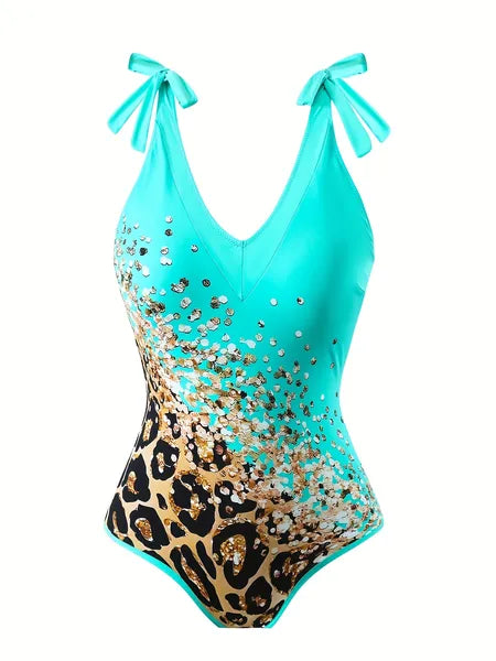 Slimming one piece swimsuit for women with blue porcelain print — poolside pose
