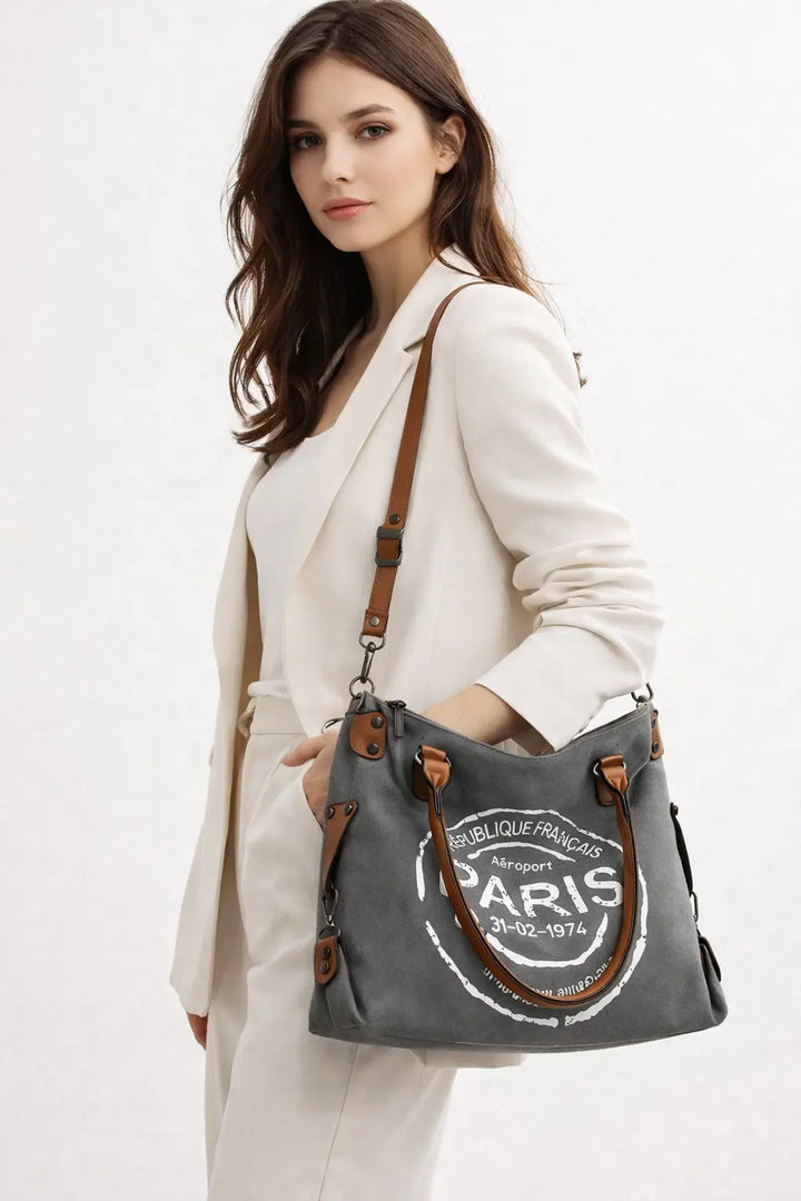 women's suede handbag medium size side profile refined finish