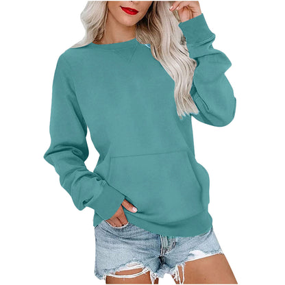 Oversized women's sweater fall 2025 peacock green full body outfit with jeans layering