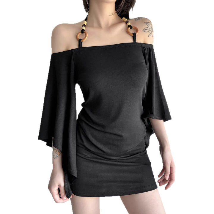 Black off-shoulder dress with wooden straps on a white background