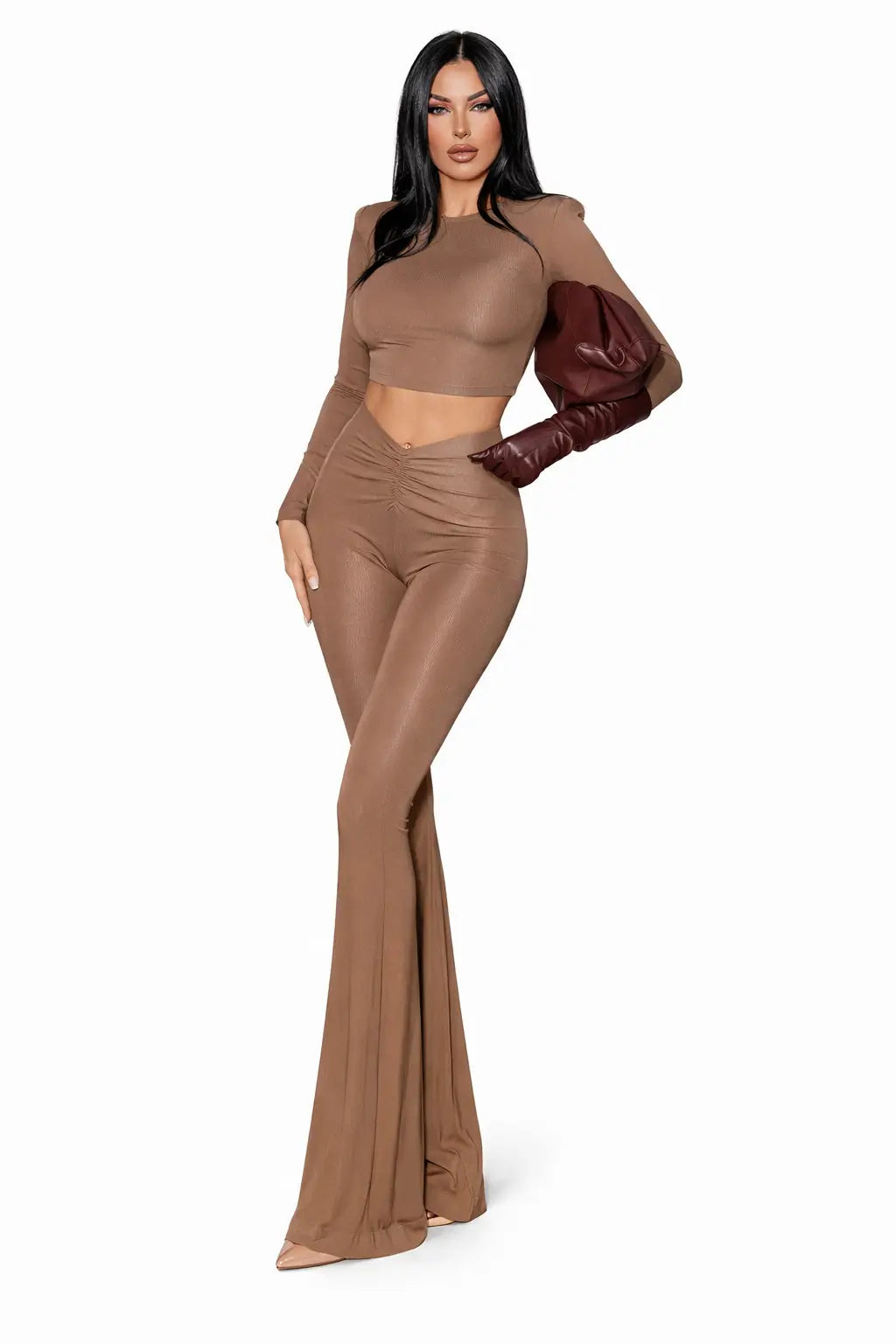 front view of gray pleated crop top and pants set on elegant European woman with ruched waist detail in premium studio