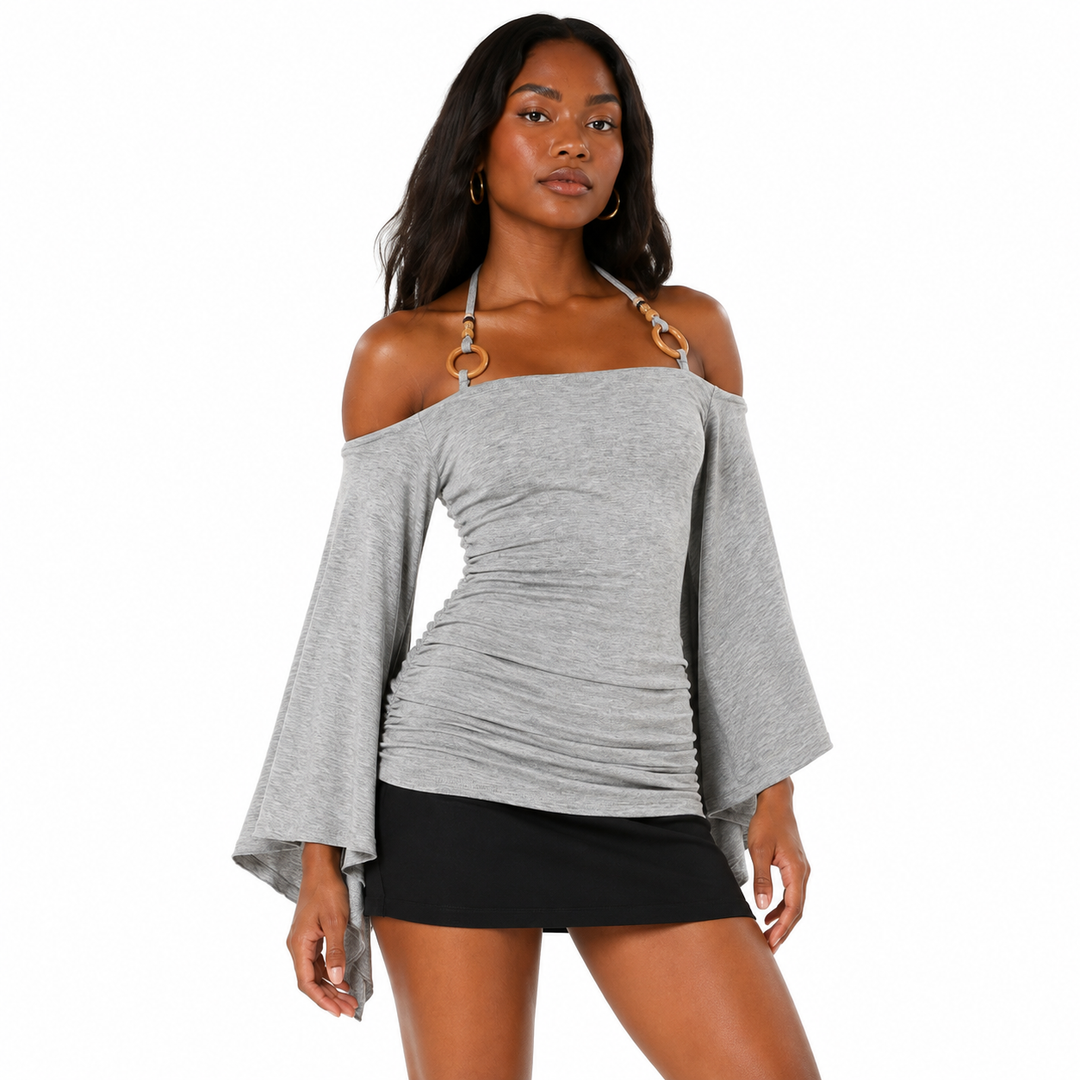 Striped off the shoulder top in sizes S, M and L with retro styling, flare sleeves, and a regular-length construction detail.

