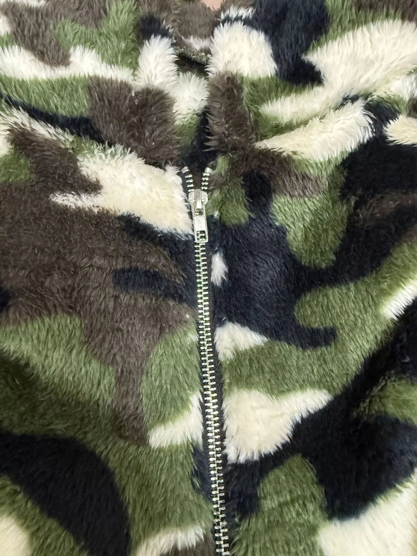 winter ready womens fuzzy camo hoodie zip up design with hood and pockets perfect for chilly outdoor activities
