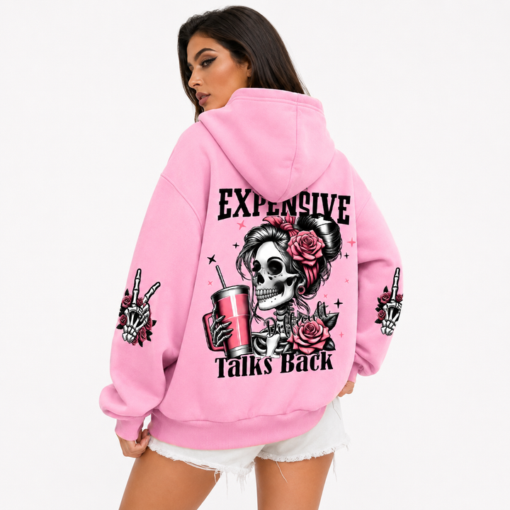 Funny printed pullover hoodie for women with statement cartoon graphic, hooded neckline and cozy fleece for fall outfits now.