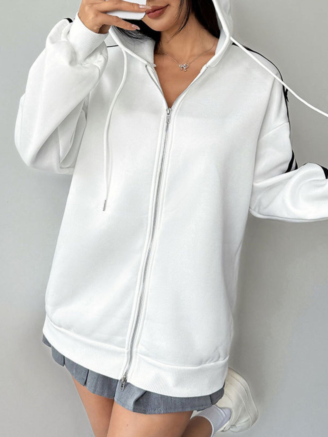 striped sleeve hoodie back view relaxed silhouette design