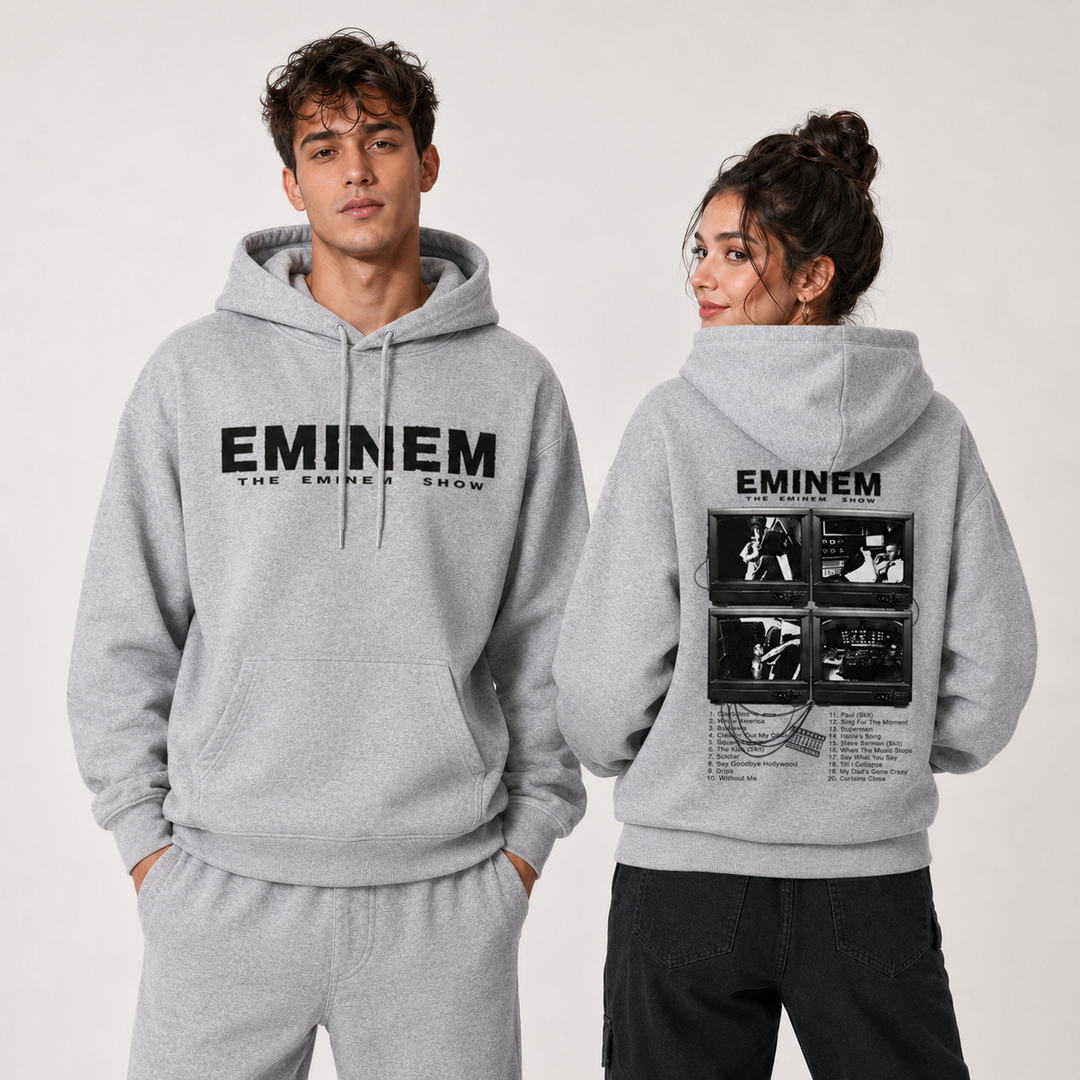 Music graphic hoodie side fit view showing the loose silhouette long sleeves and printed front design on for online shopping.