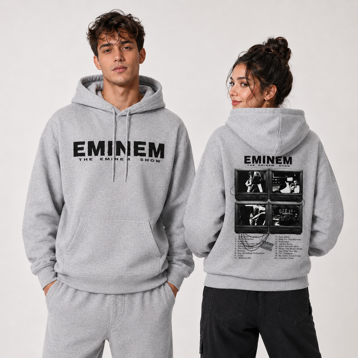 Music graphic hoodie side fit view showing the loose silhouette long sleeves and printed front design on for online shopping.