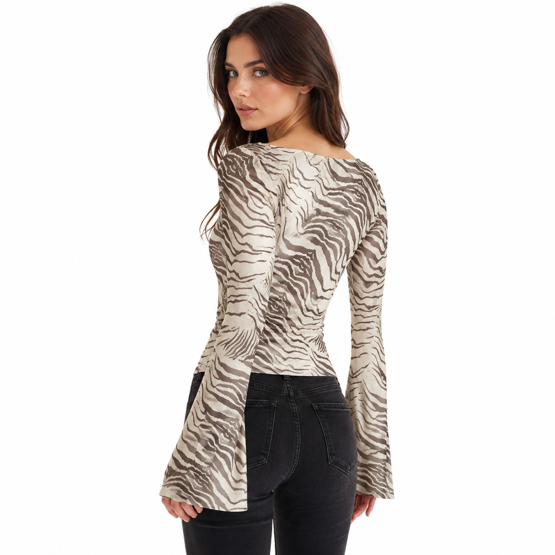 Printed loose fit womens top with animal pattern, smooth polyester fabric and refined everyday style for work or dinner daily