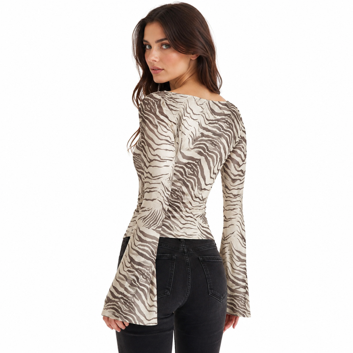 Printed loose fit womens top with animal pattern, smooth polyester fabric and refined everyday style for work or dinner daily