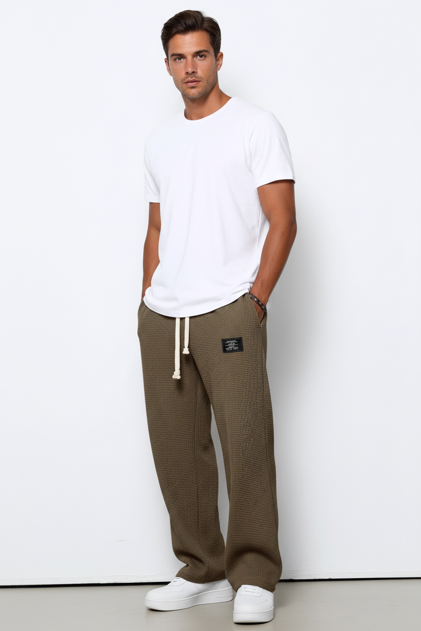 waffle straight pants men styled with sneakers urban look