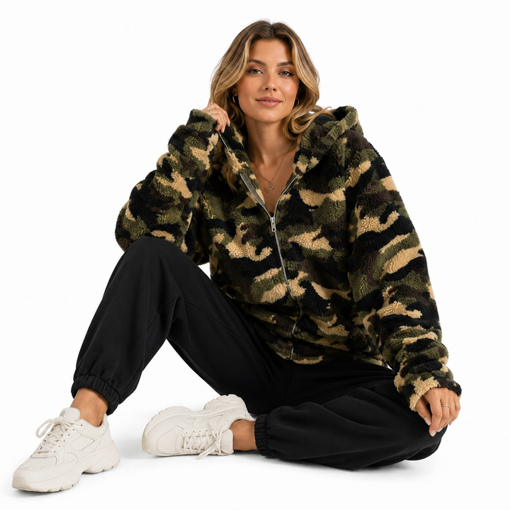 Polyester camo hoodie for women with pocketed zip-up construction for relaxed outfits, casual looks and off-duty wear easily.