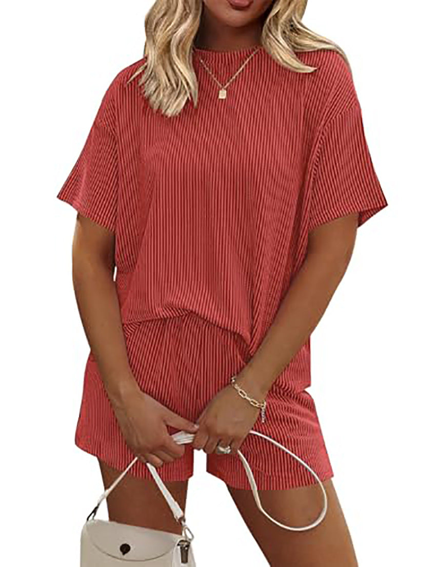 Woman wearing a red outfit with a white background