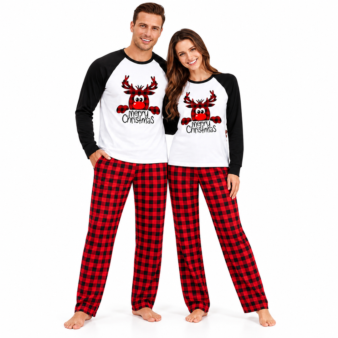 Plaid family Christmas pajamas worn by a matching couple