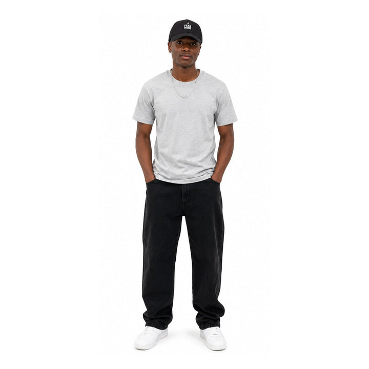 Black Fear None denim cap styled on male model against white background