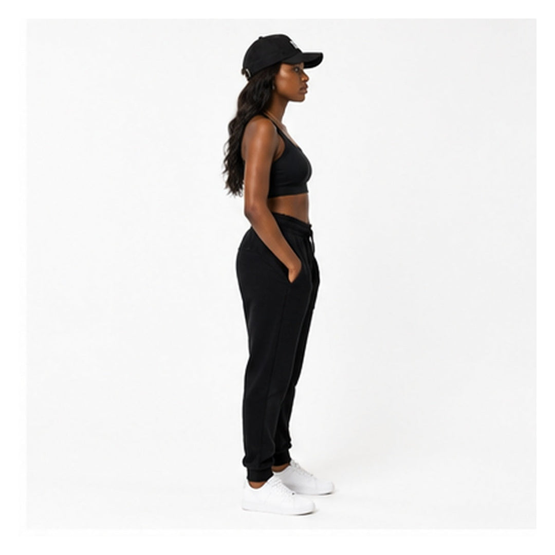 Fear None embroidered black denim cap on female model, side profile view