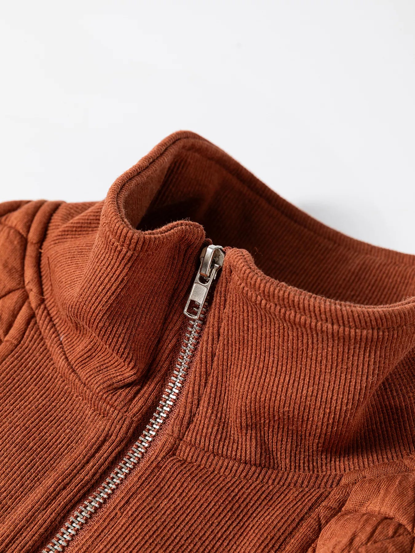 Half-zip neckline detail matte gold zipper on quilted sweatshirt premium finish