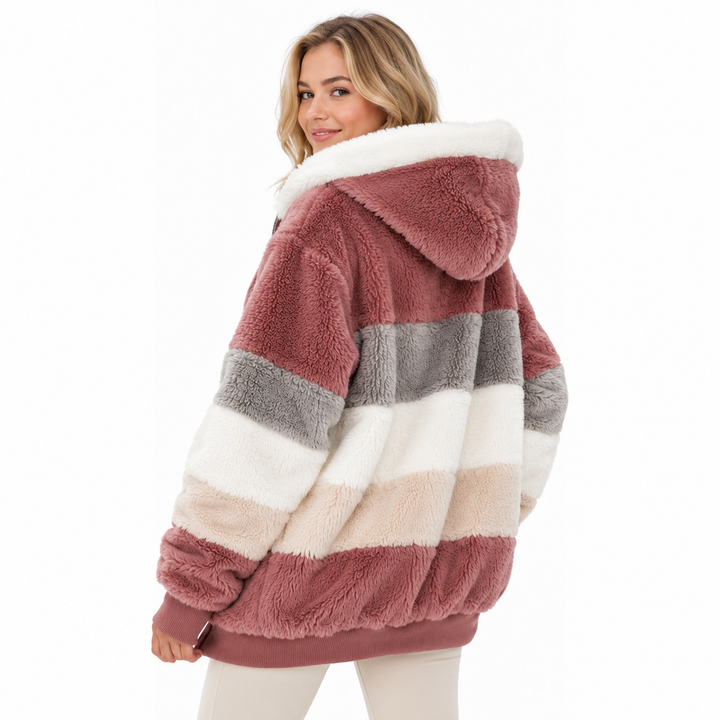 Fuzzy hooded outerwear women can wear over tees or tops, with zipper closure, drawstring hood and soft stretch feel.