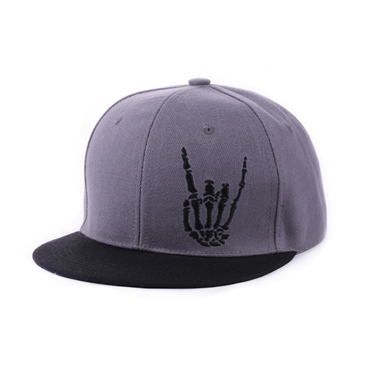 Retro flat brim cap in black worn forward on male model with casual urban streetwear look
